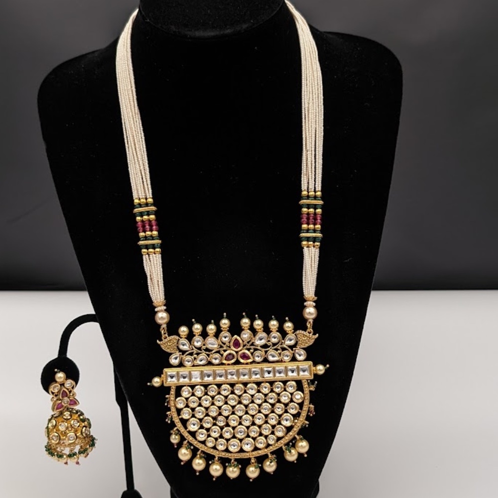 "Exquisite Indian Ethnic Meenakari Jadtar with Rice Pulse: A Radiant Ensemble of